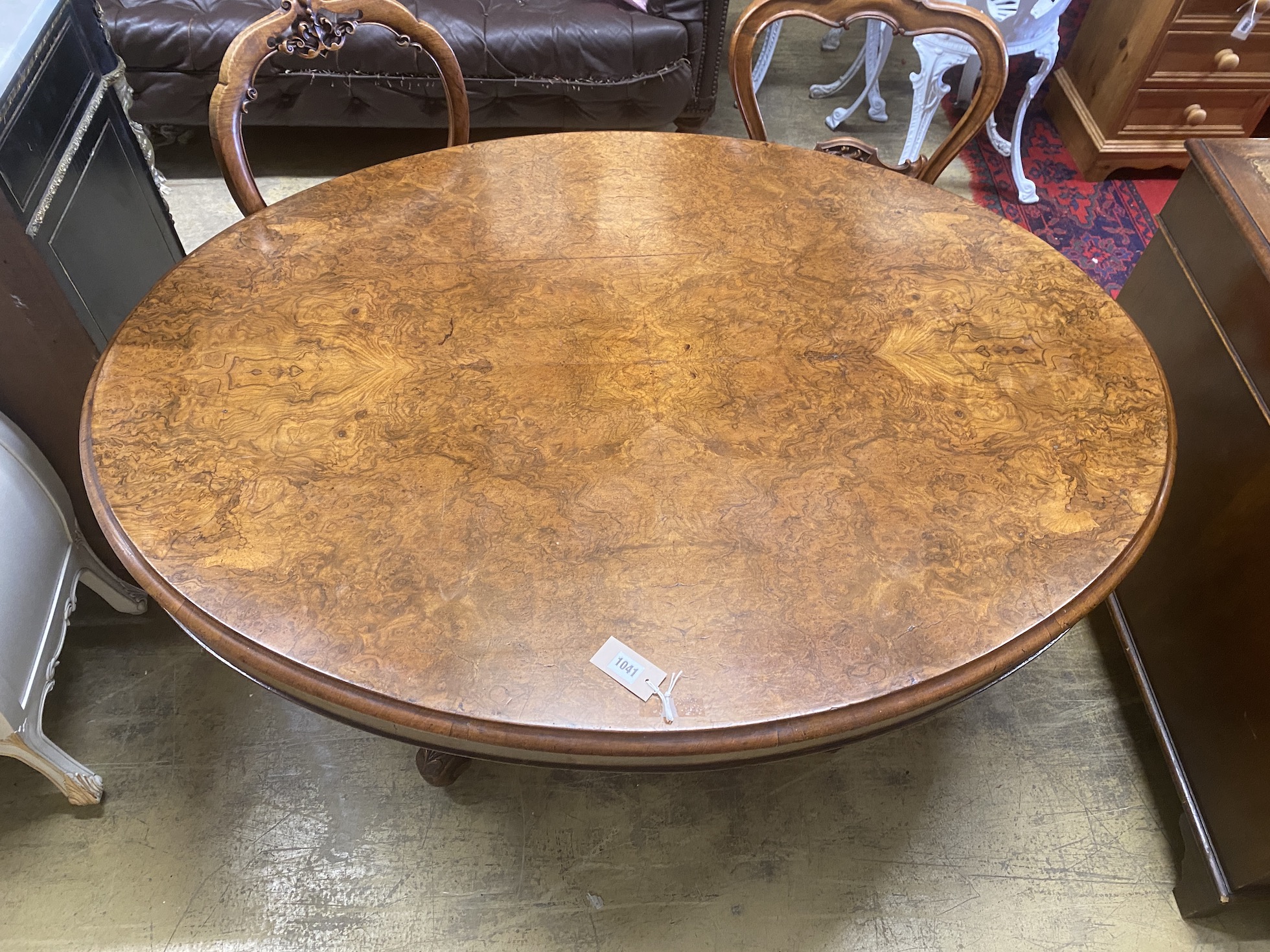 A Victorian oval figured walnut tilt top loo table, length 134cm, width 98cm, height 71cm